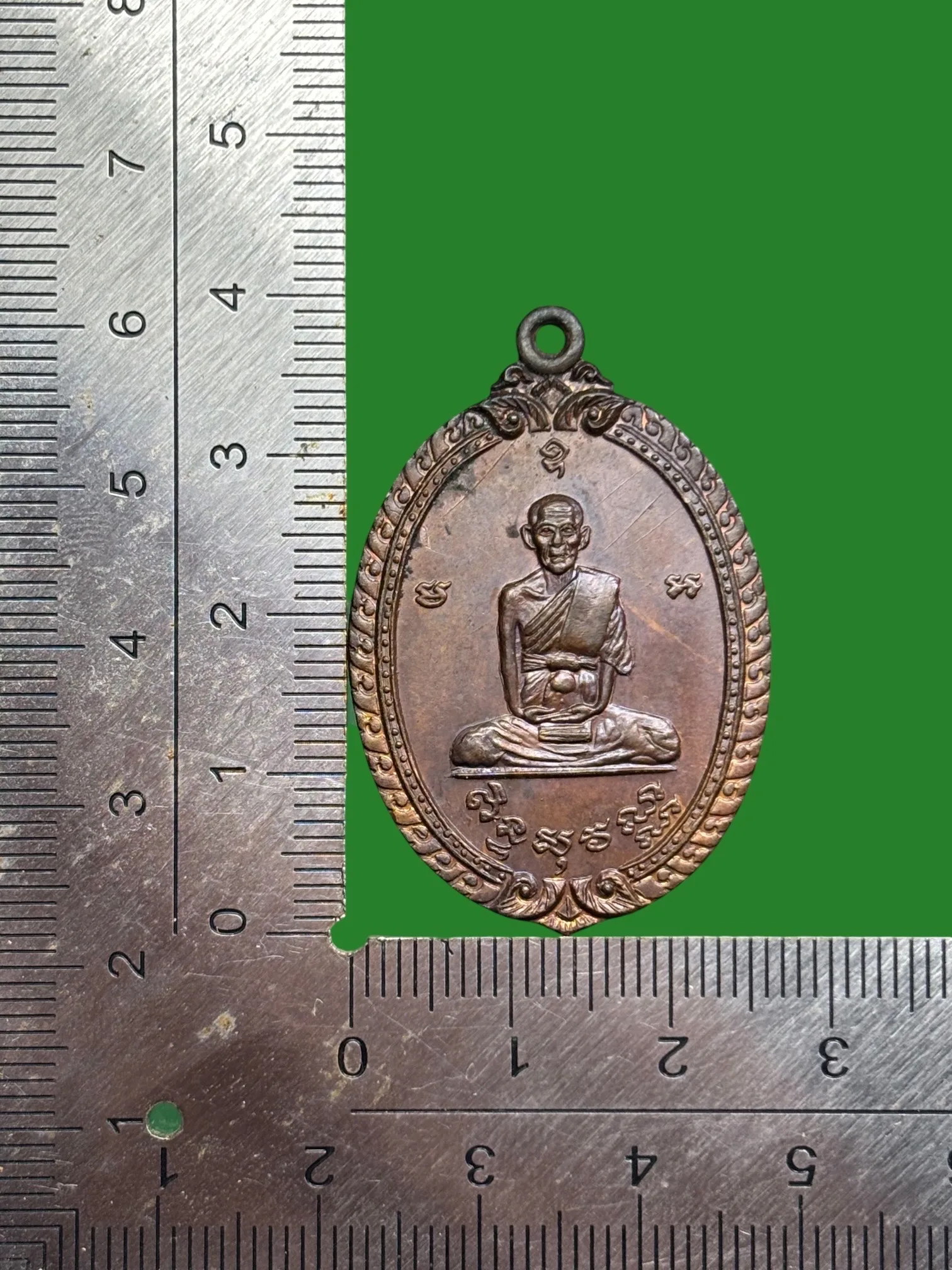 Luang Pu Sri (Siho) Wat Sakhaek B.E. 2520 4th Edition Copper Amulet — รูปที่ 4